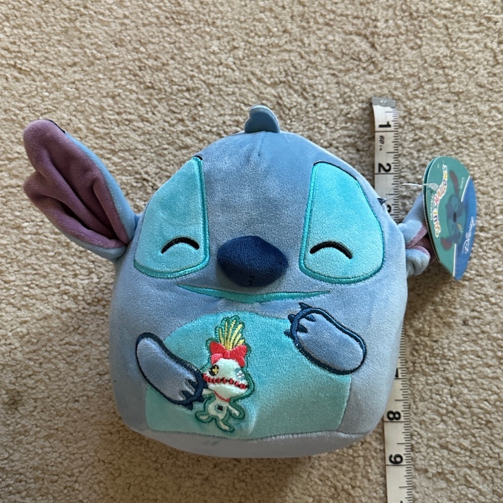 Disney Stitch holding Scrump